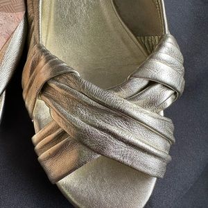 Gold open toe wedges